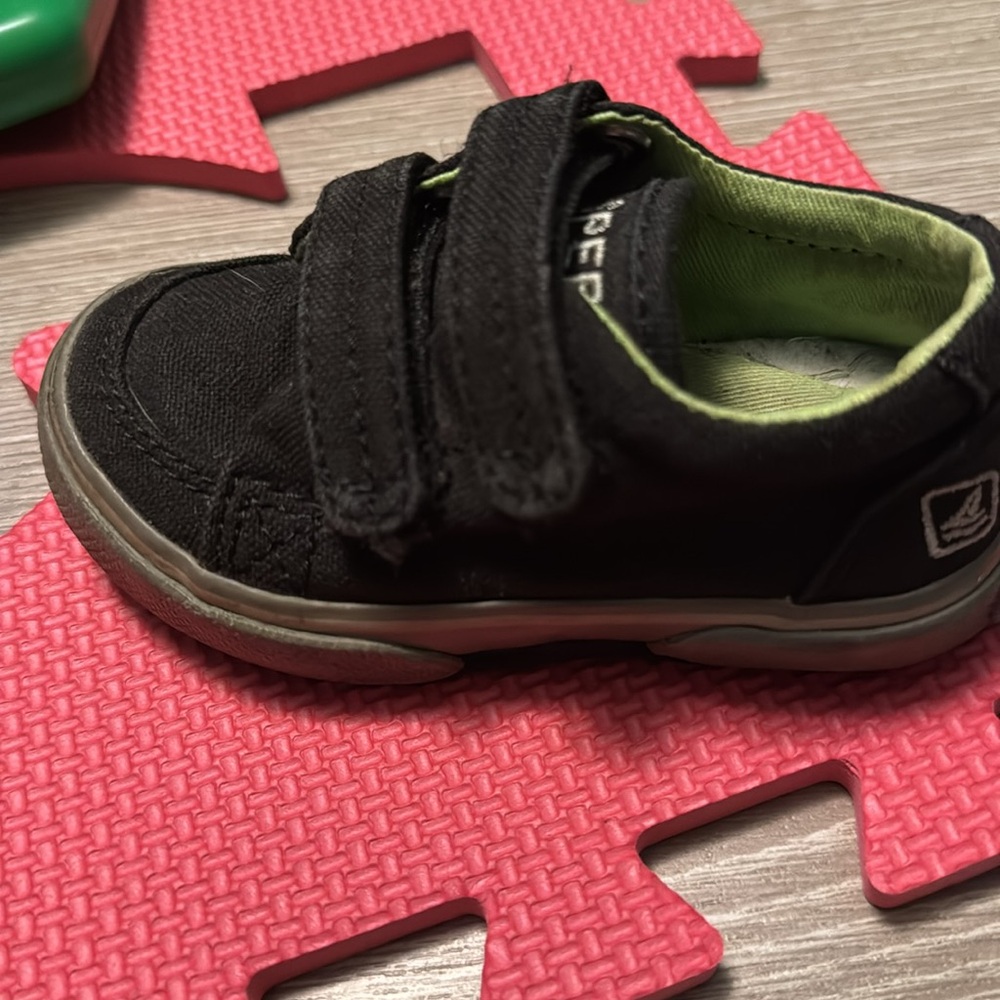 Black sperry shoes for toddlers. Sold as is. Some wear.